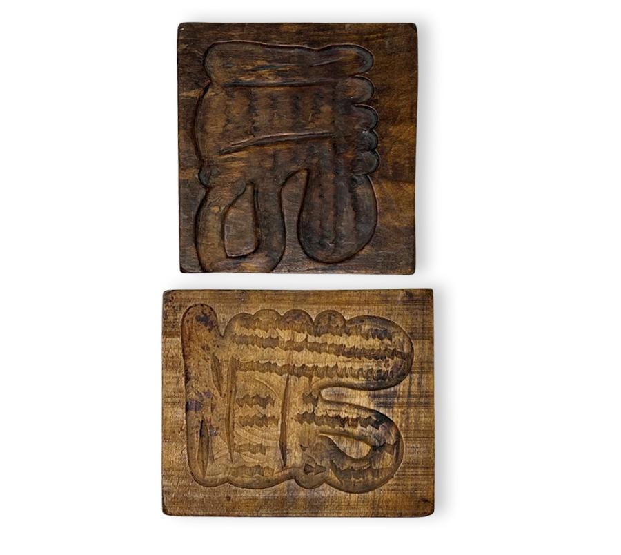 Pair of Wooden Carved Wall Hangings